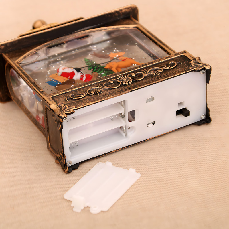 Праздничный музыкальный фонарь «Башня с Сантой, санями и оленем» 801, с подсветкой, снегопадом, музыкой, работа от ААА и USB фото - 4