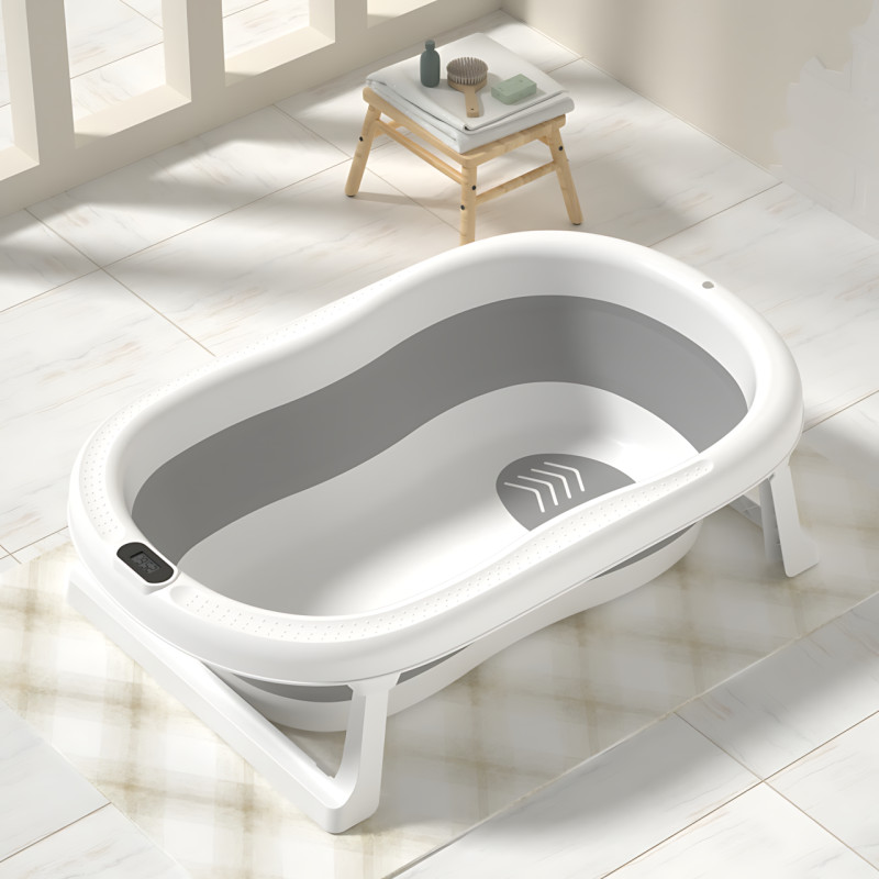 Складана дитяча ванночка з електронним термометром і м'якою подушкою, зливним корком, нековзними ніжками, сірий із зірками фото - 2