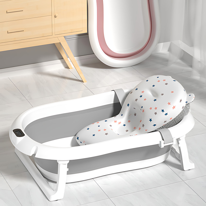Складана дитяча ванночка з електронним термометром і м'якою подушкою, зливним корком, нековзними ніжками, сірий із зірками фото - 7